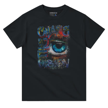 Chase the Vision black t-shirt front view showcasing a vibrant eye design with an explosion of color, symbolizing creativity and focus from the Limited Edition Collection.